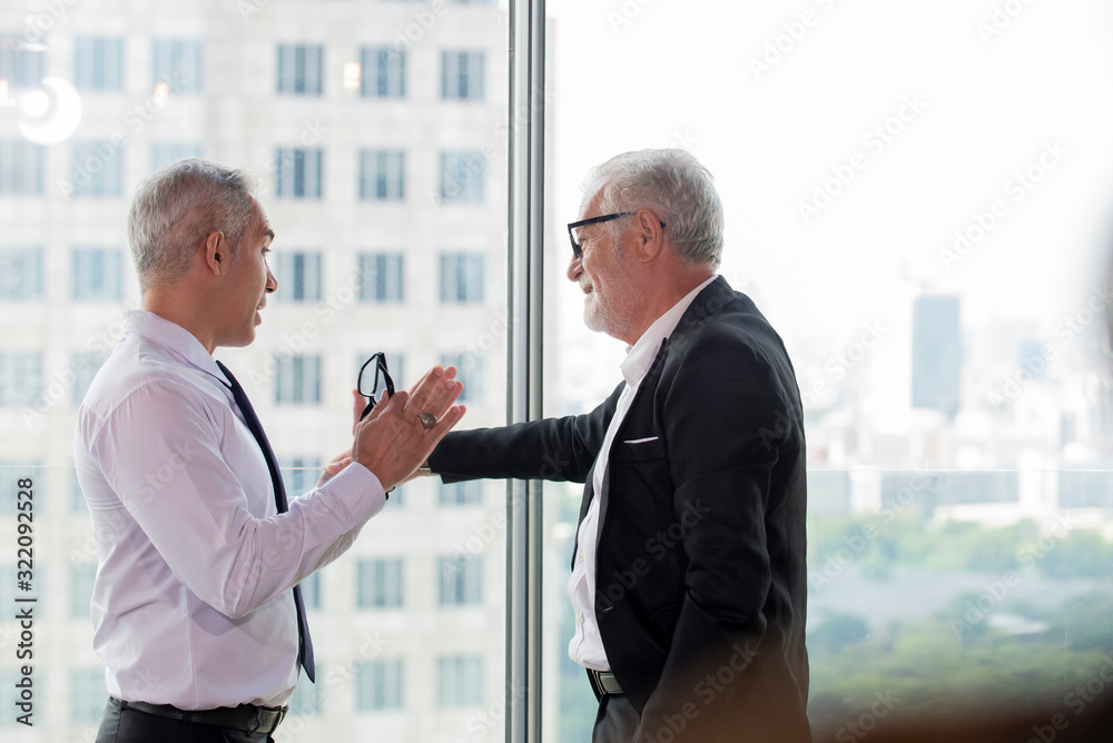 Two business man standing  at offic consult   business strategy on new project