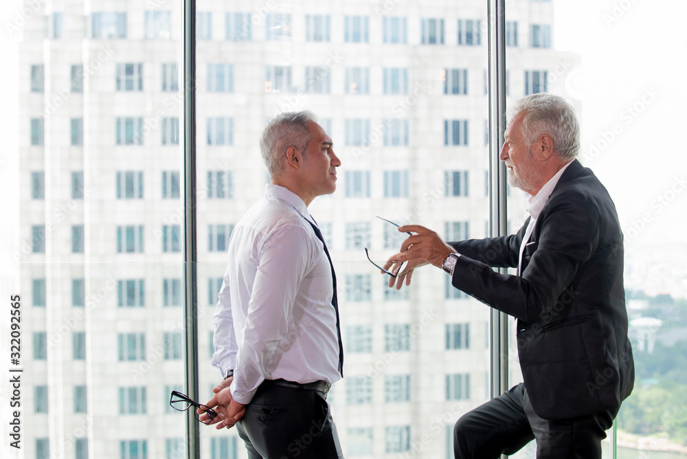 Two business man standing  at offic consult   business strategy on new project