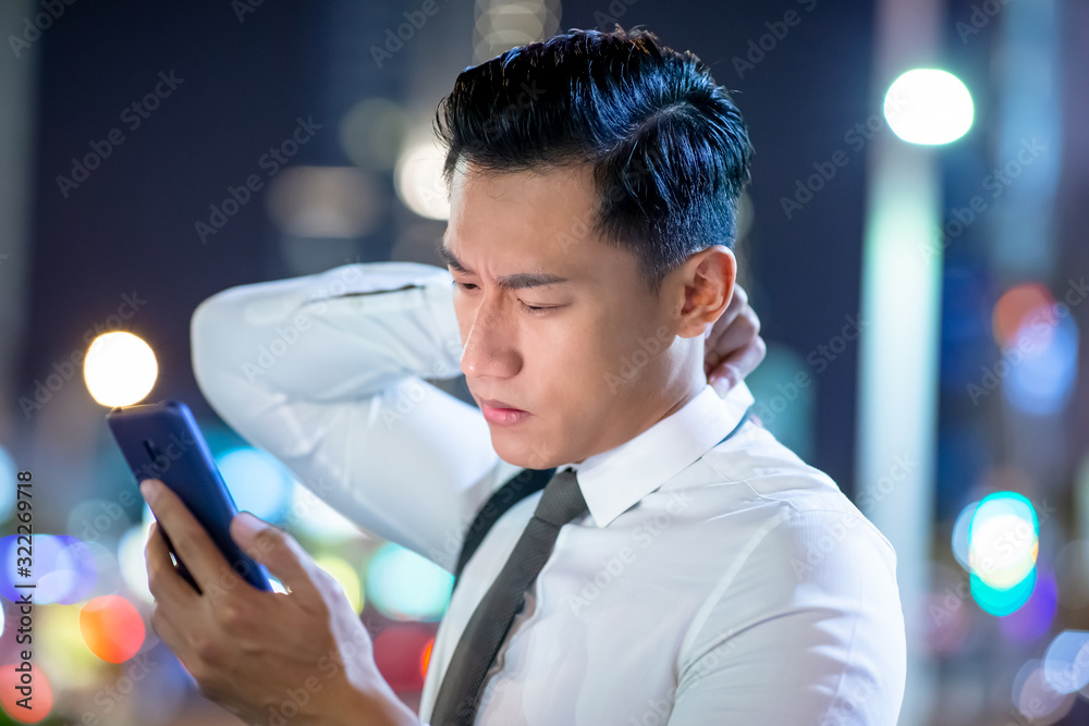 asian businessman feel neck pain