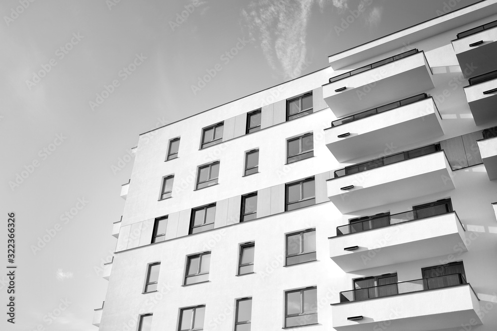 Detail of modern residential flat apartment building exterior. Fragment of new luxury house and home