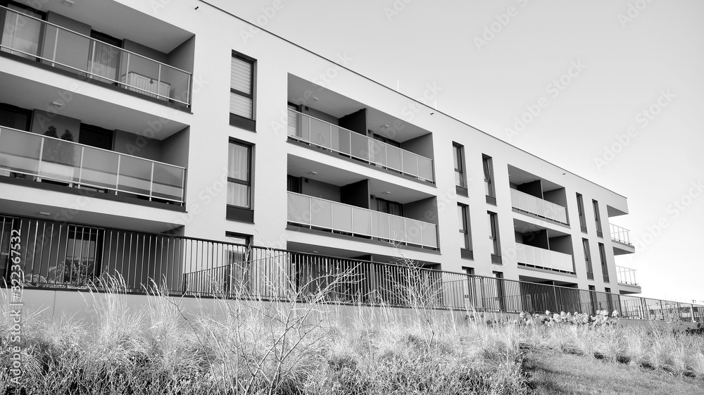 Detail of modern residential flat apartment building exterior. Fragment of new luxury house and home