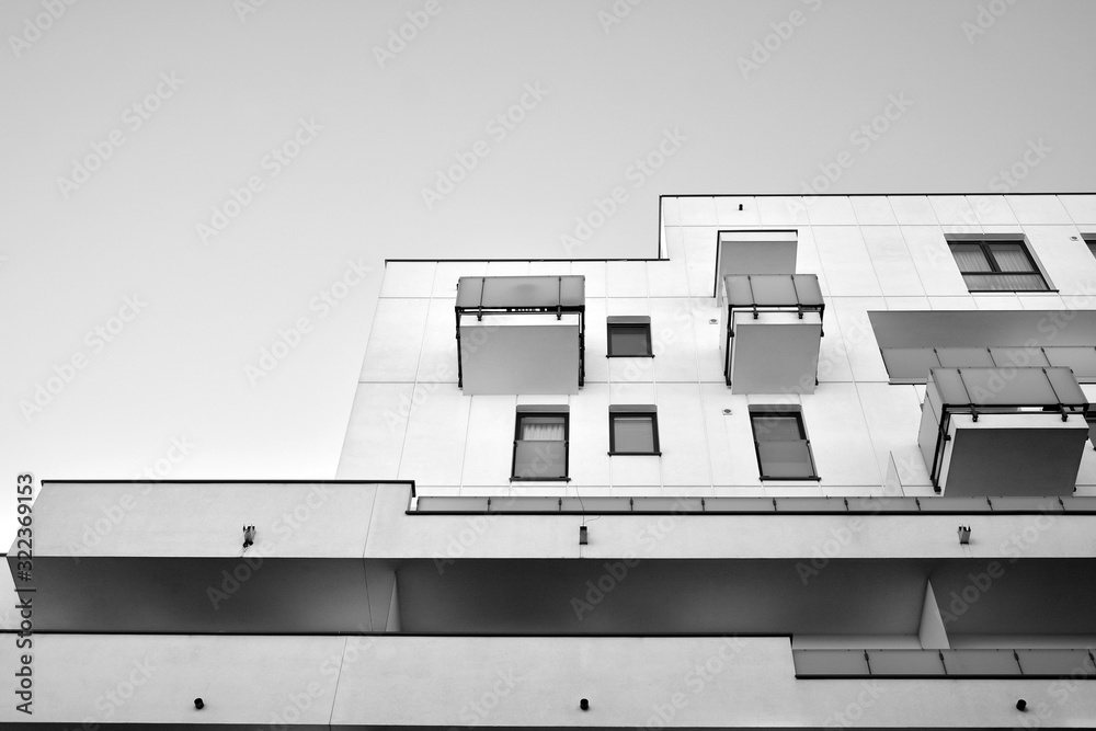 Detail of modern residential flat apartment building exterior. Fragment of new luxury house and home