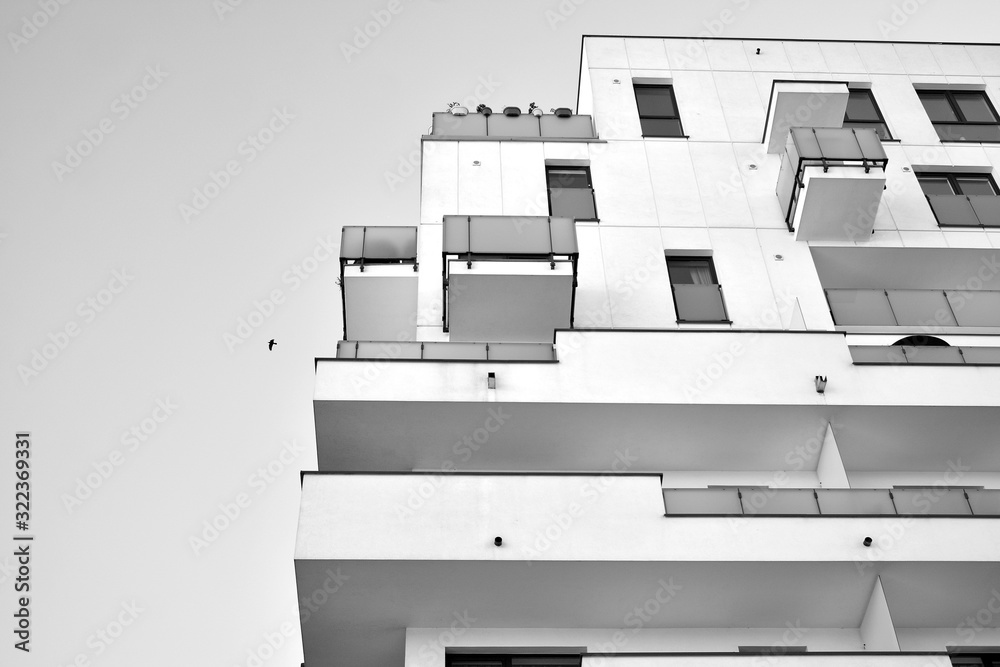 Detail of modern residential flat apartment building exterior. Fragment of new luxury house and home