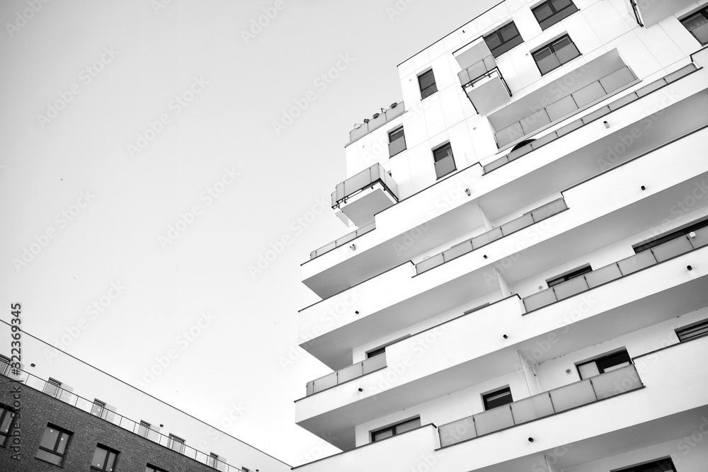 Detail of modern residential flat apartment building exterior. Fragment of new luxury house and home