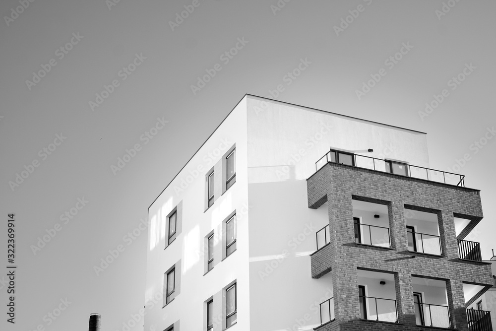 Detail of modern residential flat apartment building exterior. Fragment of new luxury house and home