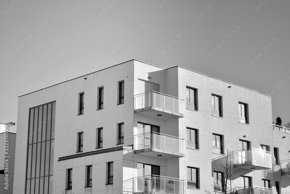 Detail of modern residential flat apartment building exterior. Fragment of new luxury house and home