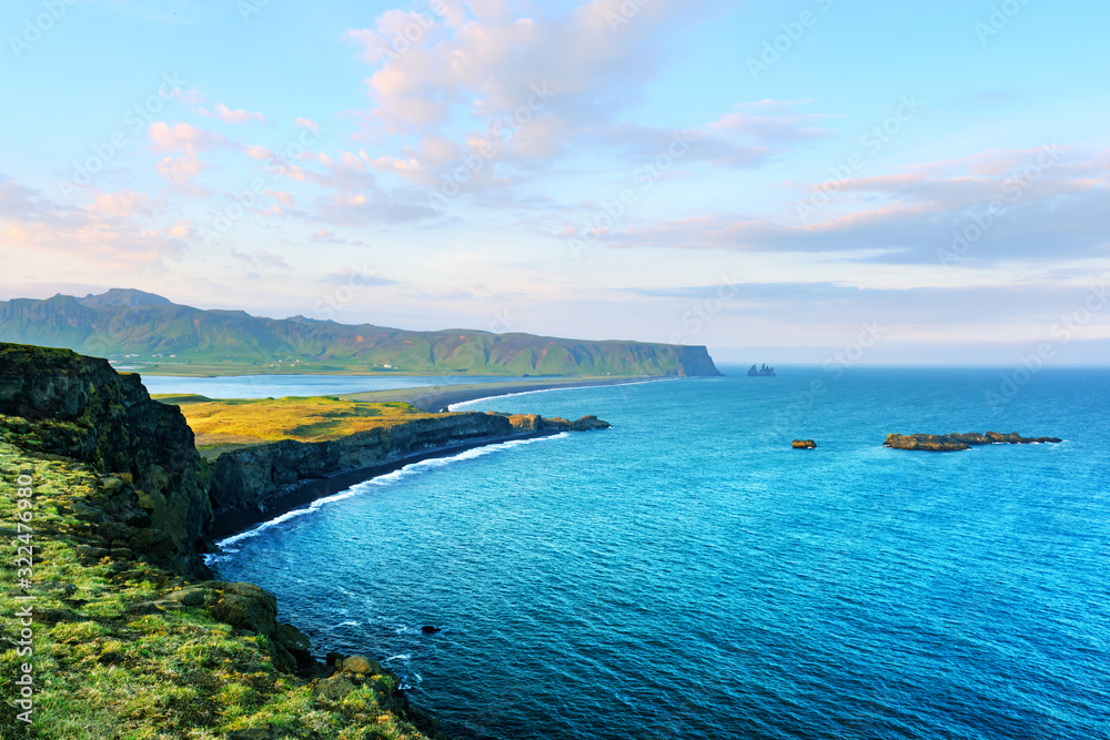 Gorgeous view of the Black beach and troll toes. Reynisdrangar, Vik, Iceland