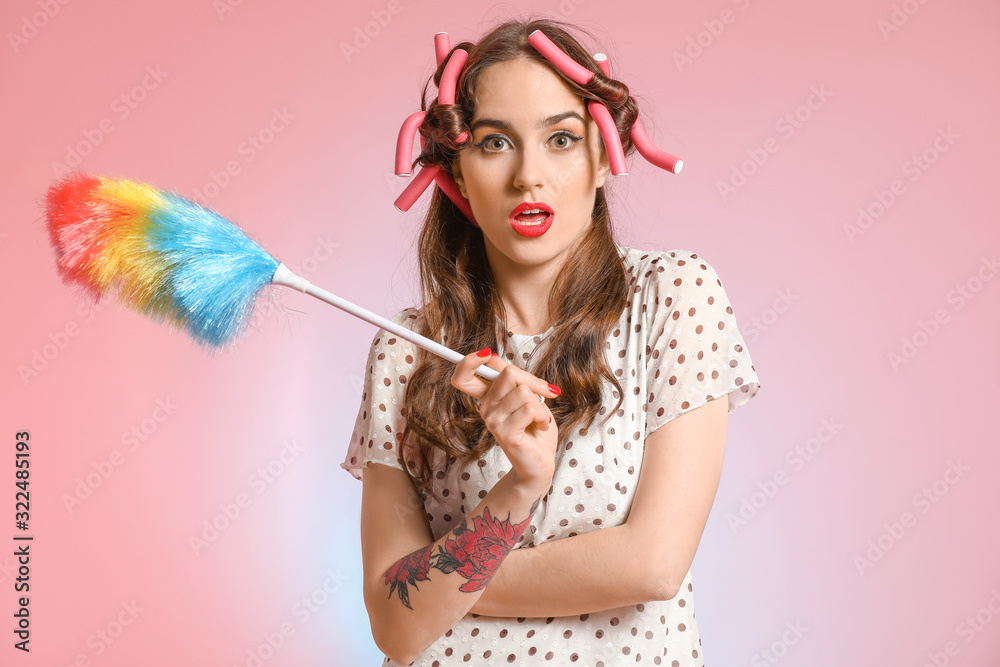 Funny housewife on color background