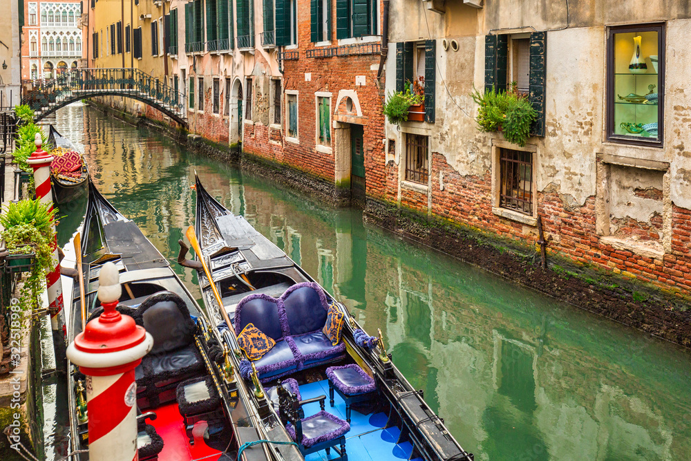 Canals of Venice city with traditional colorful architecture, Italy