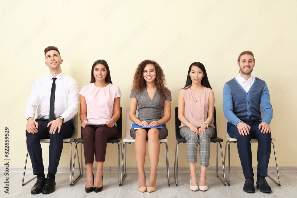 Young people waiting for job interview indoors