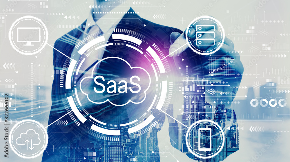 SaaS - software as a service concept with businessman on a city background