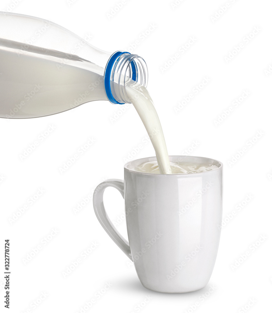 Pouring milk isolated on white background with clipping path