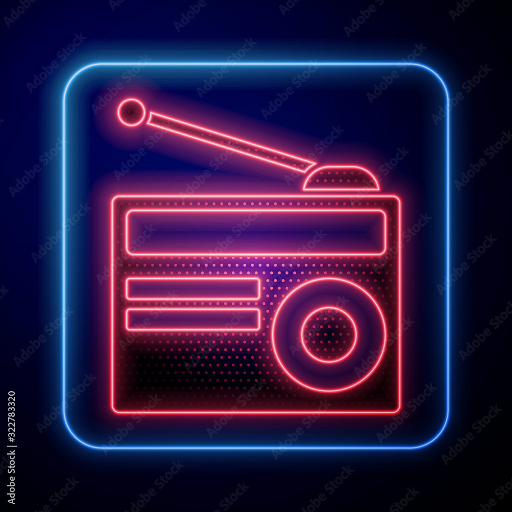 Glowing neon Radio with antenna icon isolated on blue background.  Vector Illustration