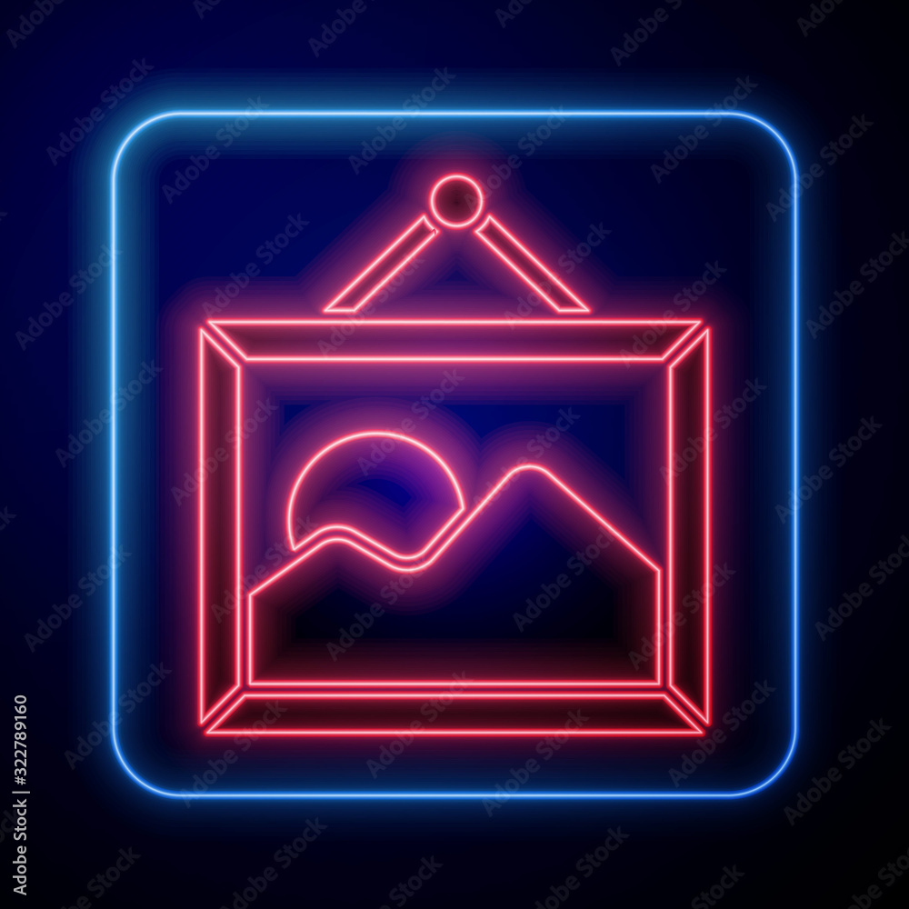 Glowing neon Picture landscape icon isolated on blue background.  Vector Illustration