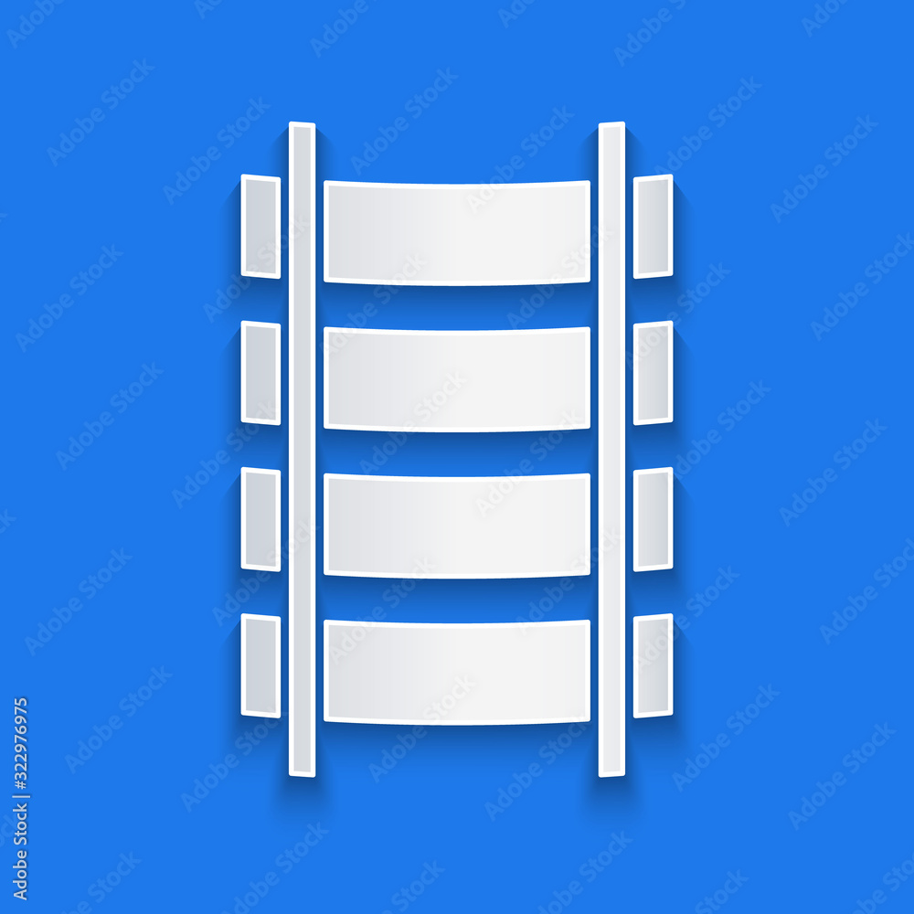 Paper cut Railway, railroad track icon isolated on blue background. Paper art style. Vector Illustra