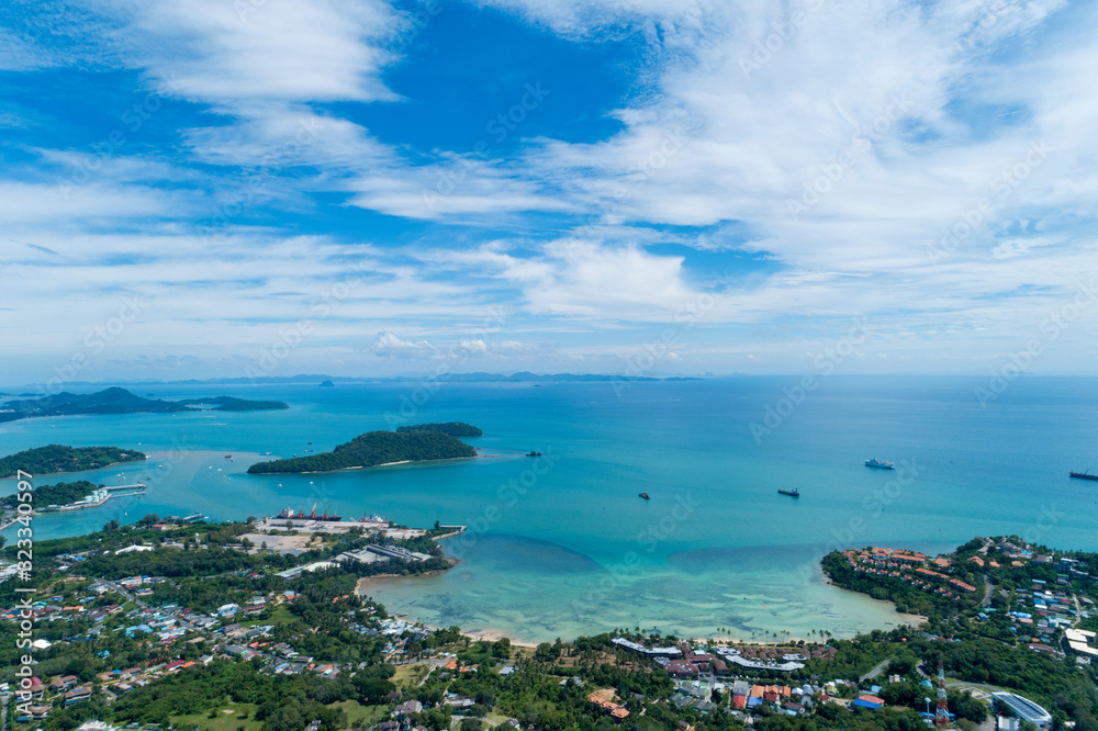 Aerial drone birds eye view photo of tropical sea with Beautiful island at phuket thailand.