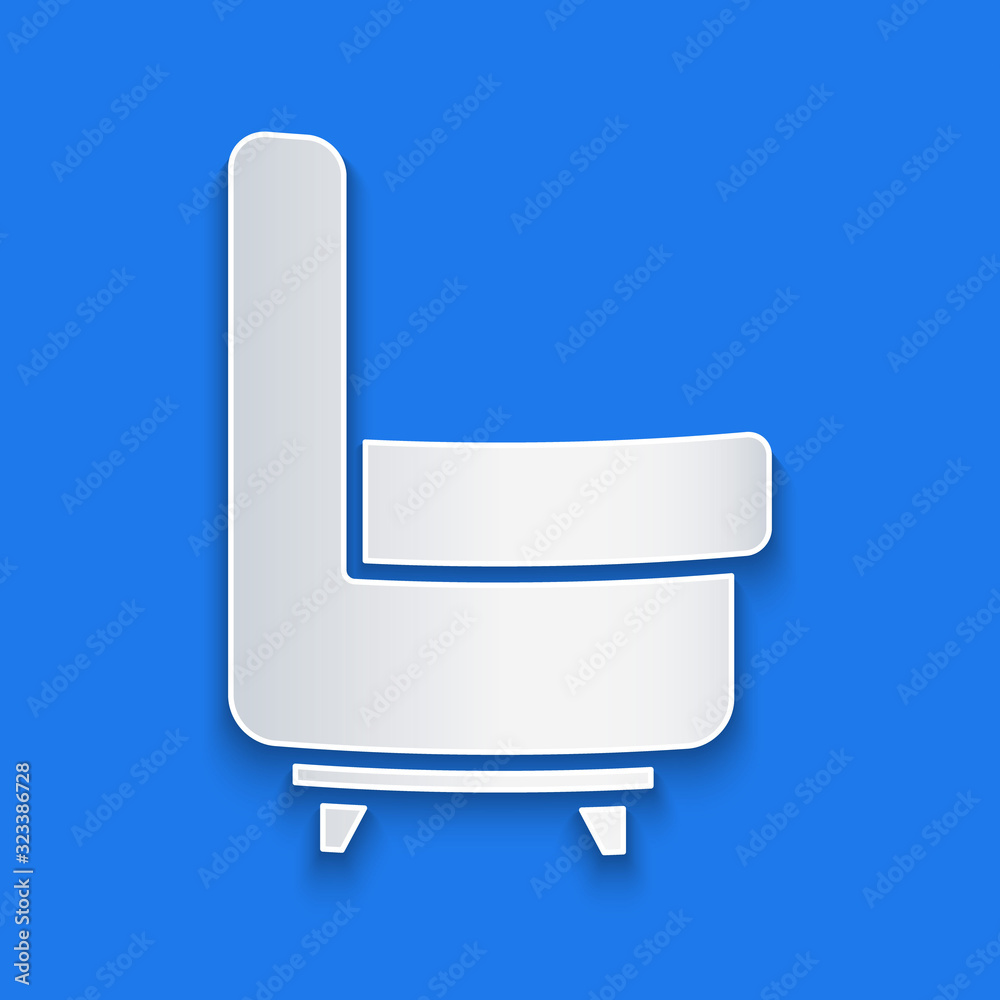 Paper cut Armchair icon isolated on blue background. Paper art style. Vector Illustration