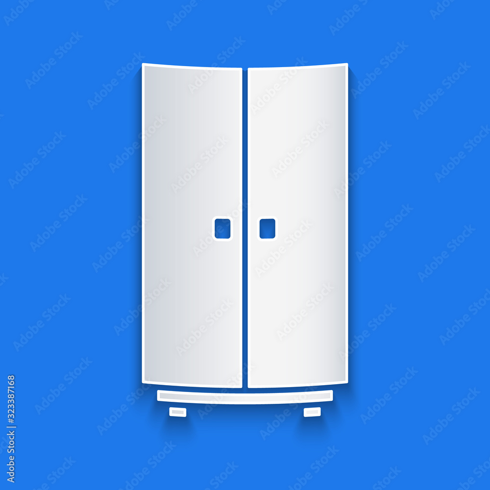 Paper cut Wardrobe icon isolated on blue background. Paper art style. Vector Illustration