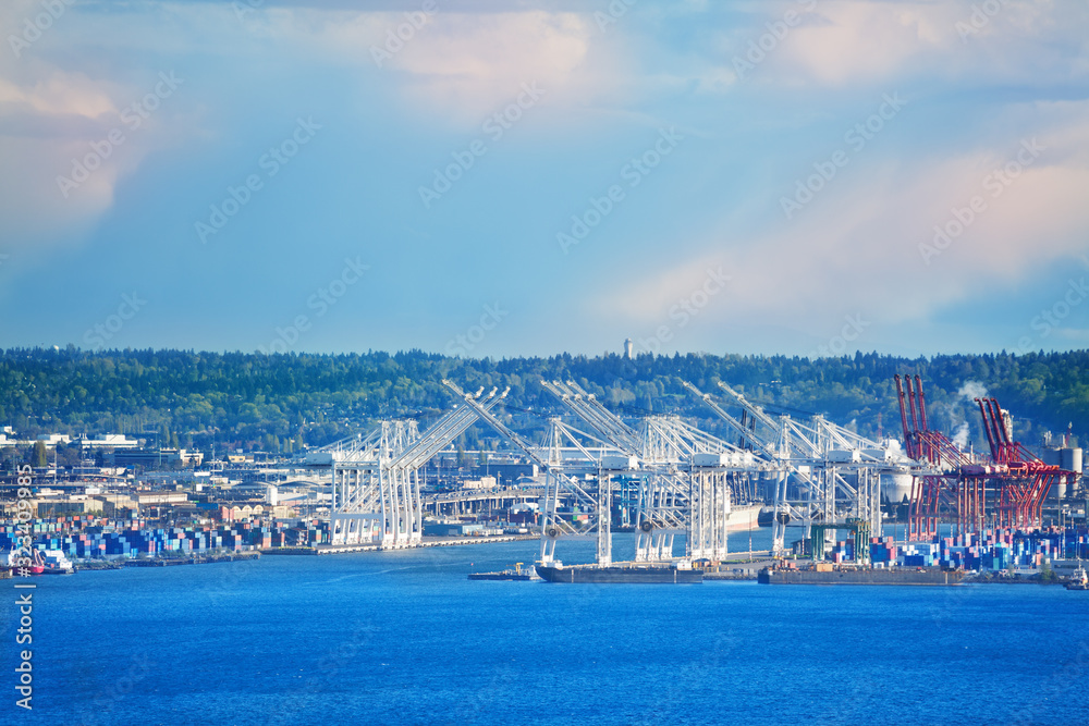 Port of Seattle with cranes and docks for ships over Elliot bay, Washington, USA