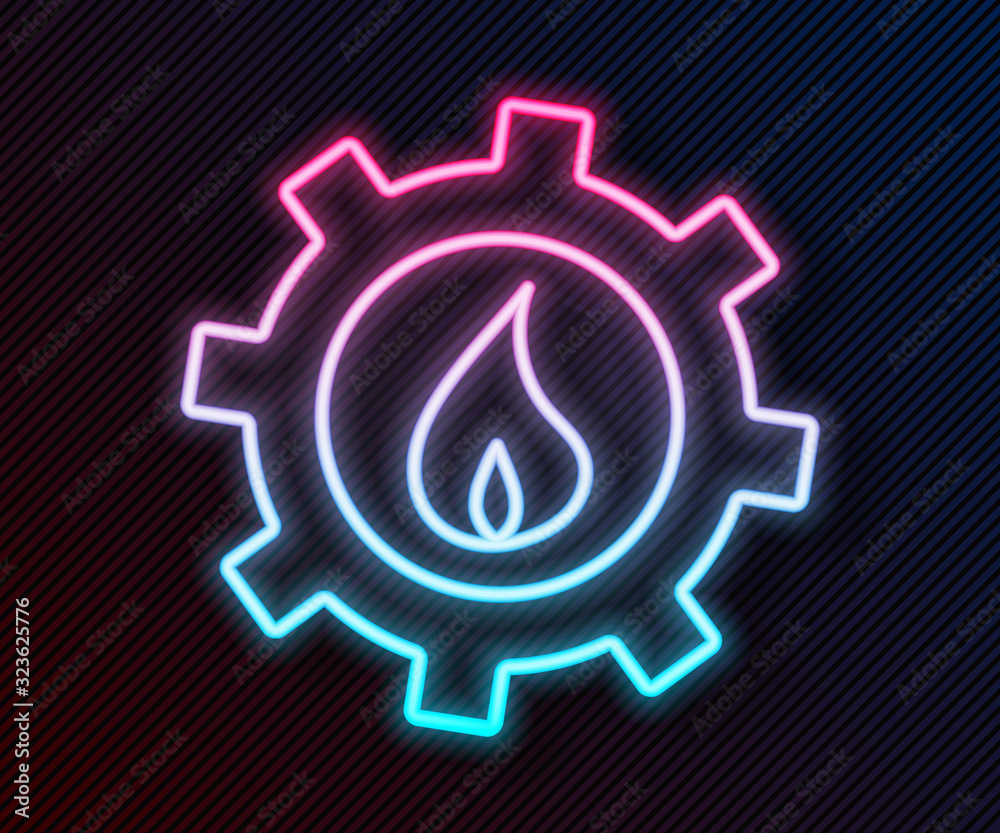 Glowing neon line Oil and gas industrial factory building icon isolated on black background. Vector 