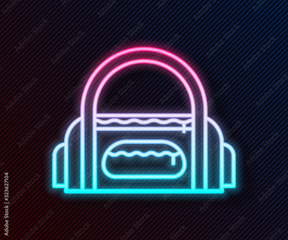 Glowing neon line Sport bag icon isolated on black background. Vector Illustration