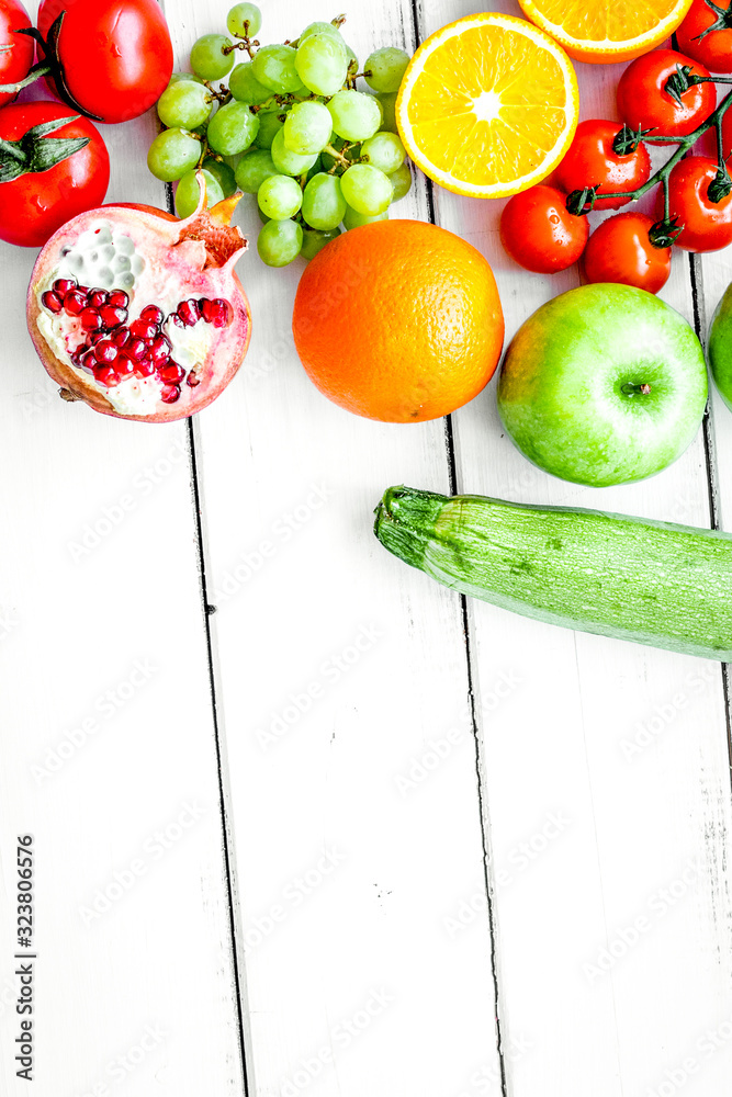 diet food with fresh fruits and vegetables salad white background top view mockup