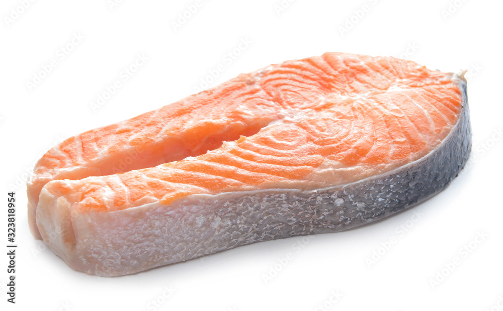 Raw salmon steak on white background