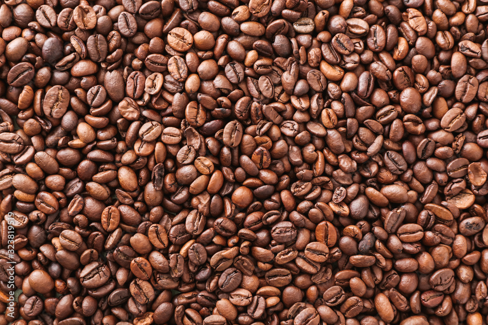 Many coffee beans as background