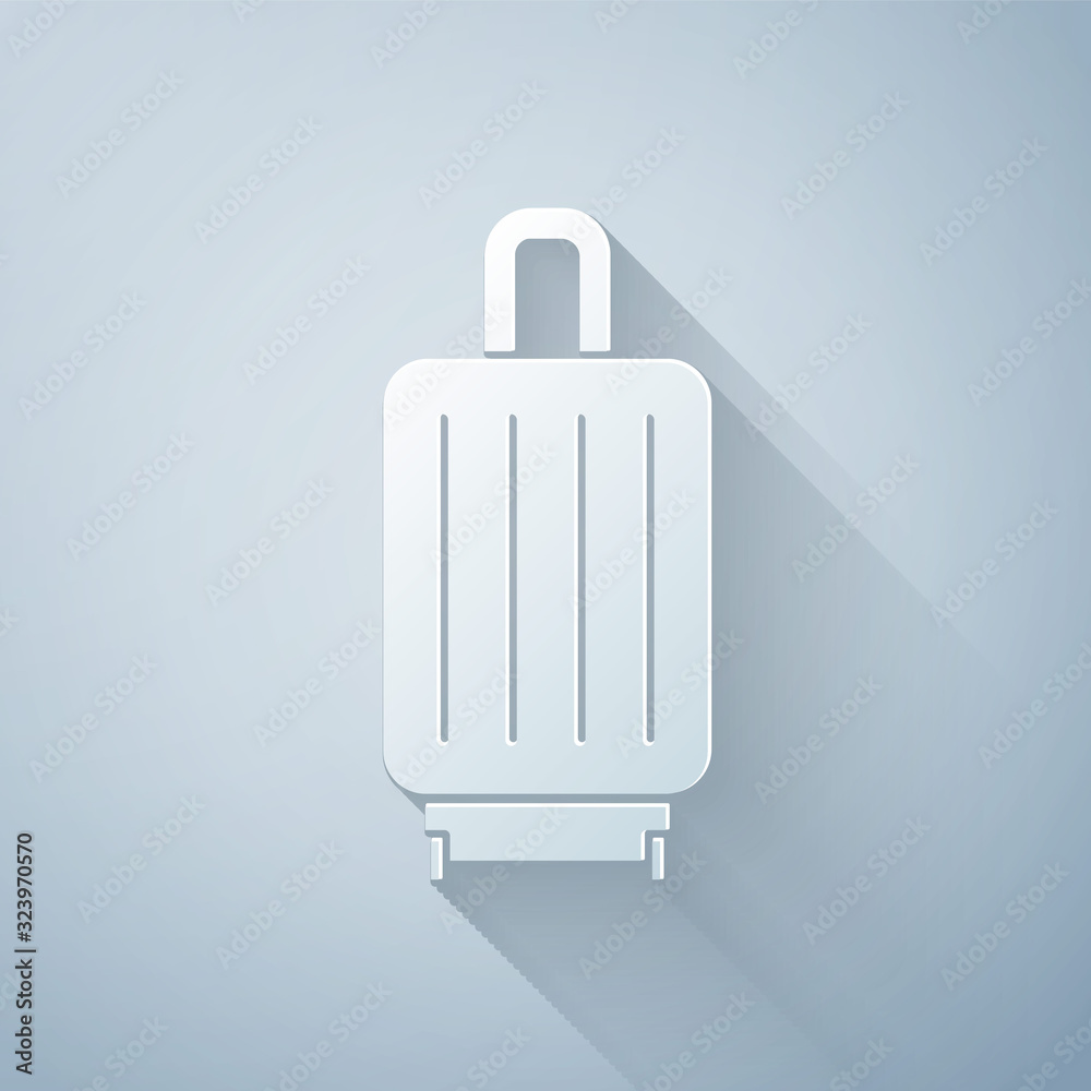 Paper cut Suitcase for travel icon isolated on grey background. Traveling baggage sign. Travel lugga