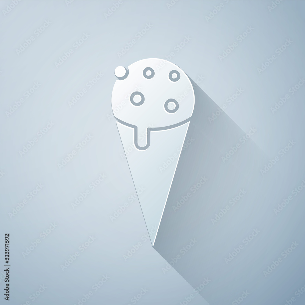 Paper cut Ice cream in waffle cone icon isolated on grey background. Sweet symbol. Paper art style. 