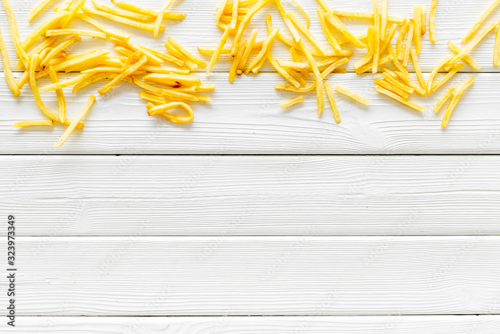 French fries frame on white background top-down copy space