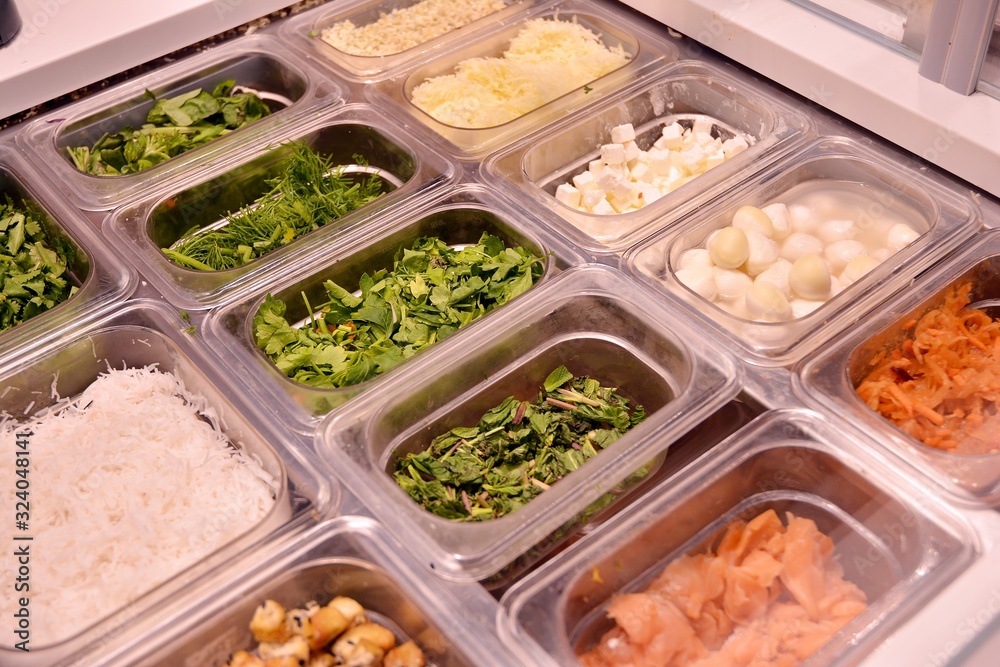 Salad bar with vegetables in the restaurant, healthy food.