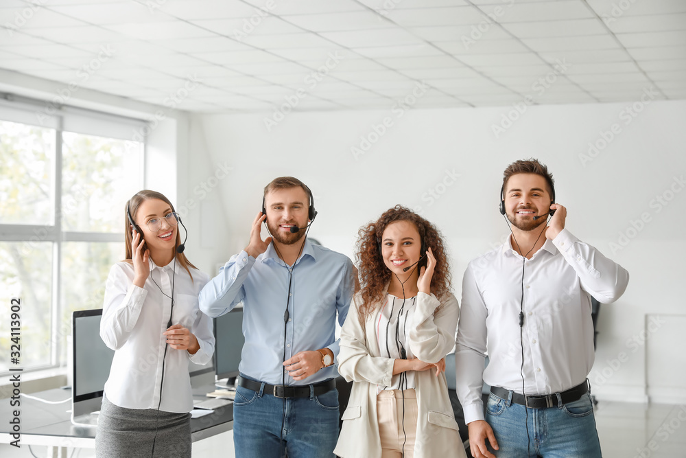 Portrait of technical support agents in office