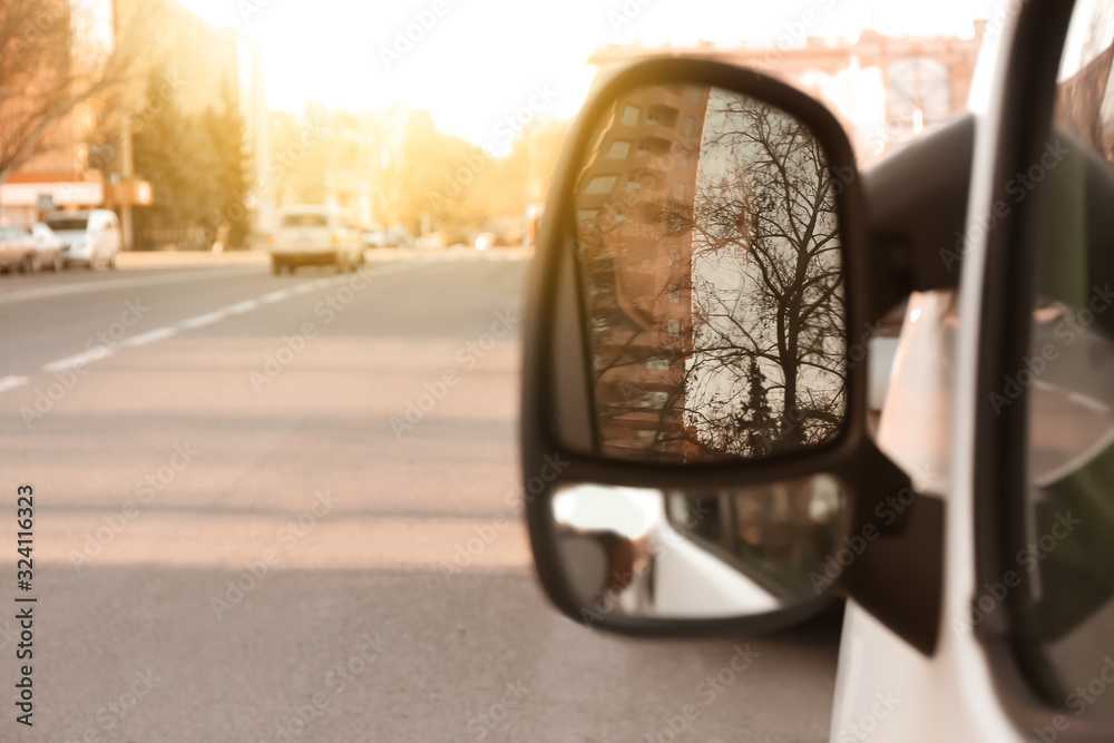 View of car side mirror, closeup