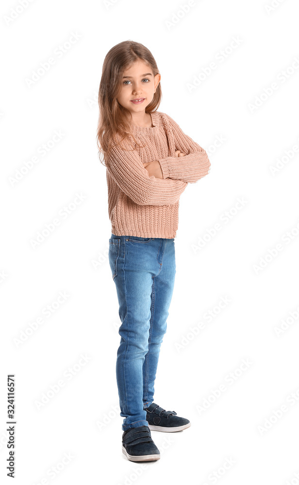 Cute little girl in winter clothes on white background