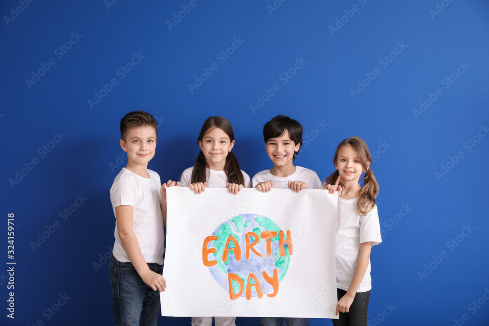 Little children with drawing on color background. Earth Day celebration