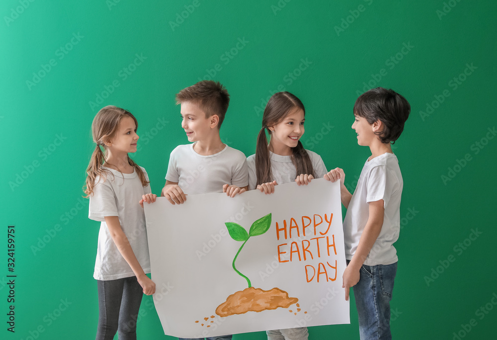 Little children with drawing on color background. Earth Day celebration