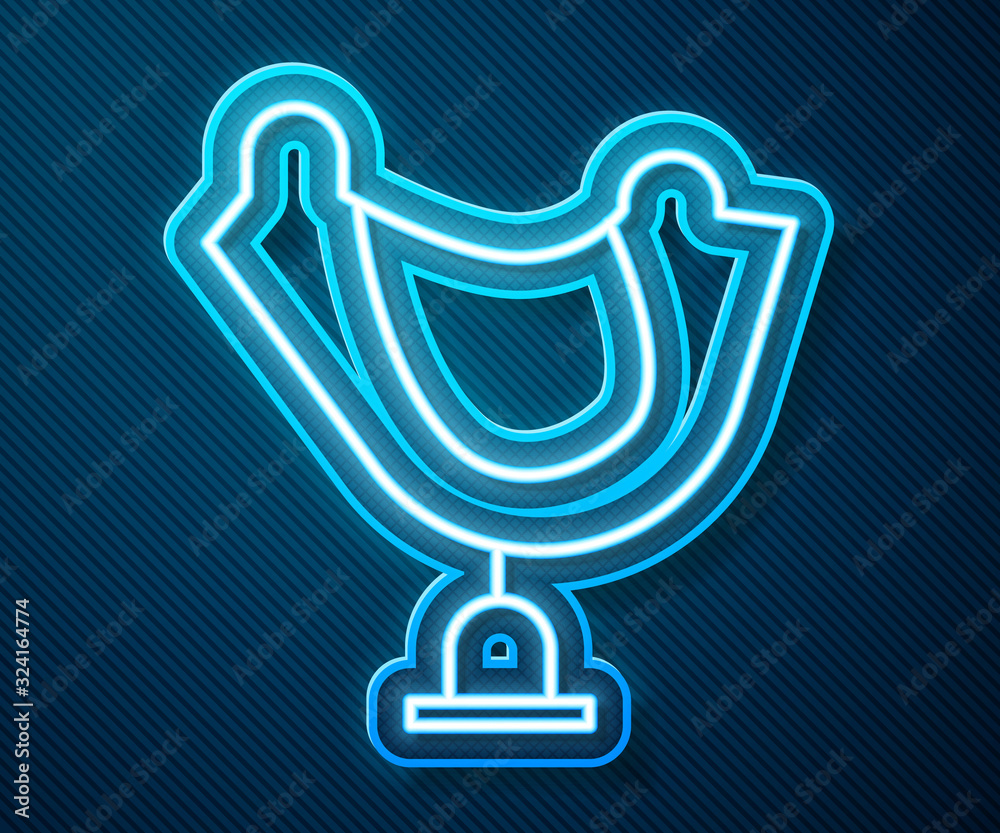 Glowing neon line Wild west saddle icon isolated on blue background. Vector Illustration