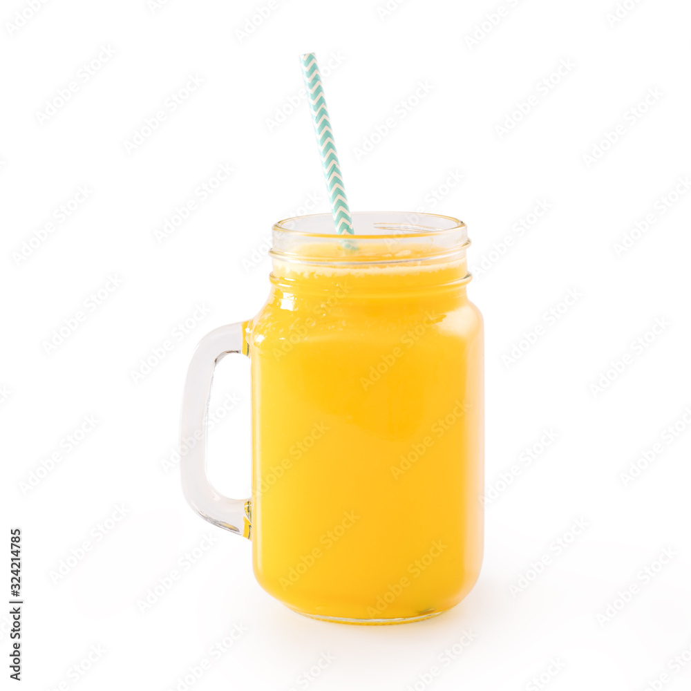 Fresh tropical mango juice with beautiful diced fruit flesh, striped paper straw isolated on white b