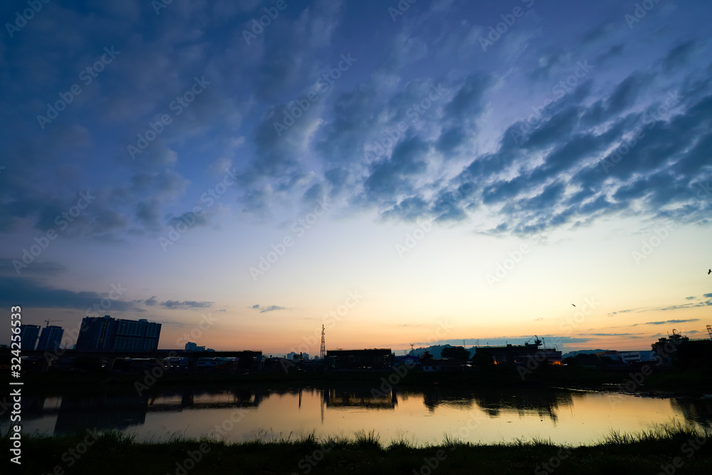 Beautiful and amazing nature sunrise sky with clouds .