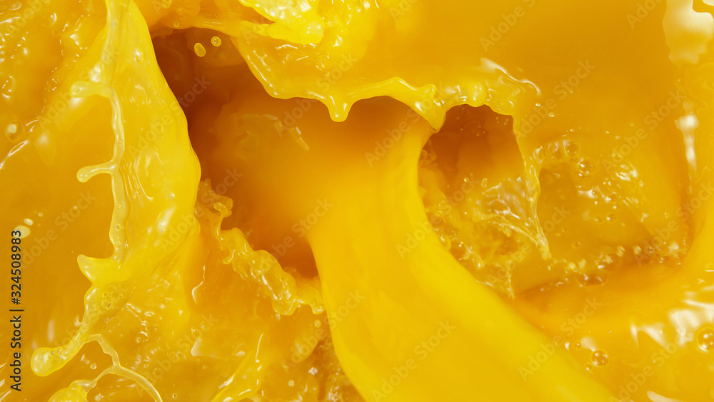 Detail of pouring orange juice