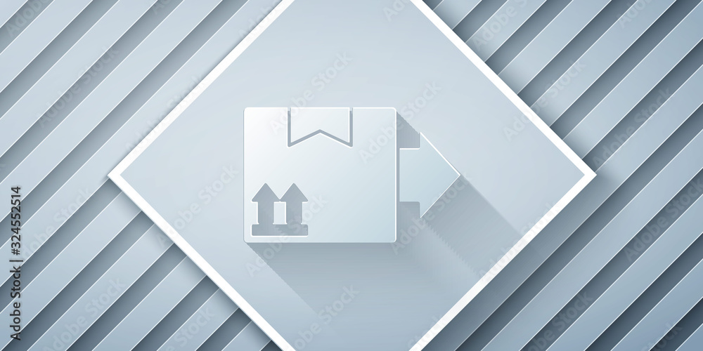 Paper cut Cardboard box with traffic symbol icon isolated on grey background. Box, package, parcel. 