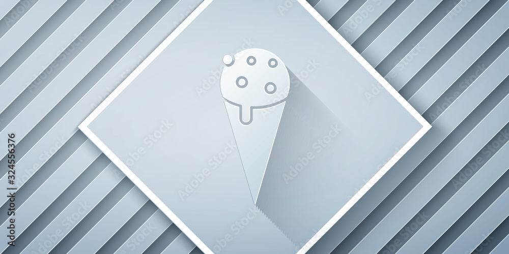 Paper cut Ice cream in waffle cone icon isolated on grey background. Sweet symbol. Paper art style. 