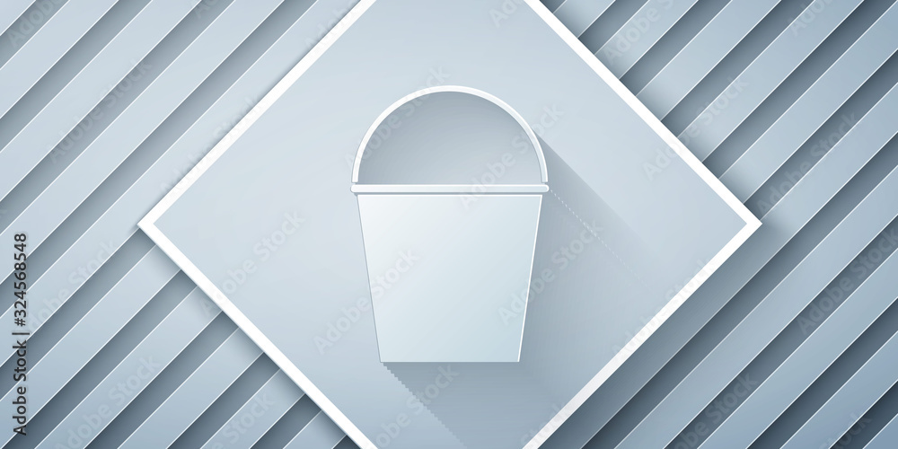 Paper cut Fire bucket icon isolated on grey background. Metal bucket empty or with water for fire fi