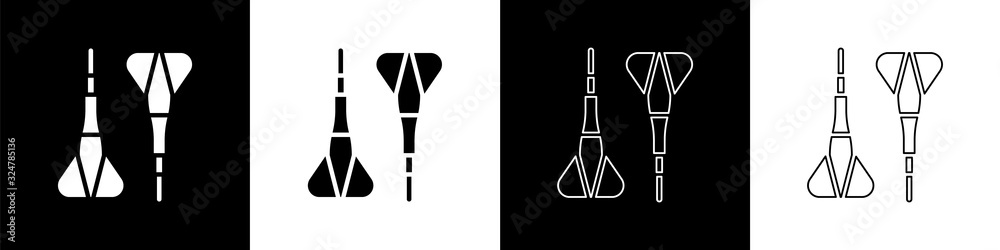将飞镖箭头图标隔离在黑白背景上。矢量插图