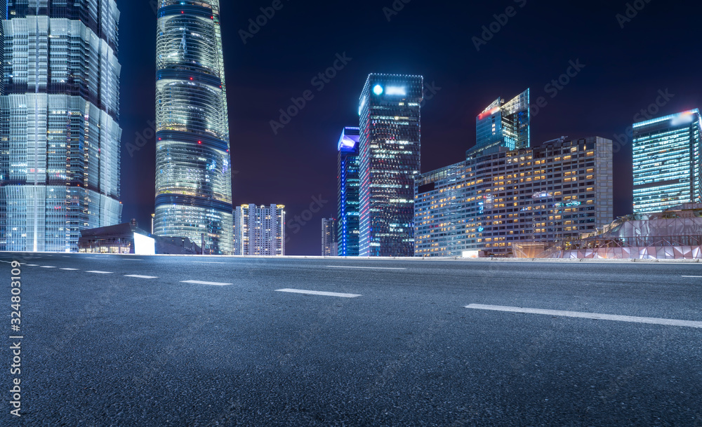 Night view and office building of architectural street in Lujiazui Financial District, Shanghai..