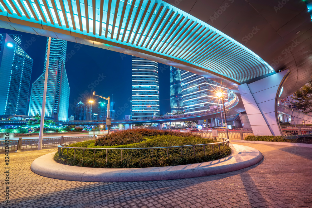 Night view and office building of architectural street in Lujiazui Financial District, Shanghai..