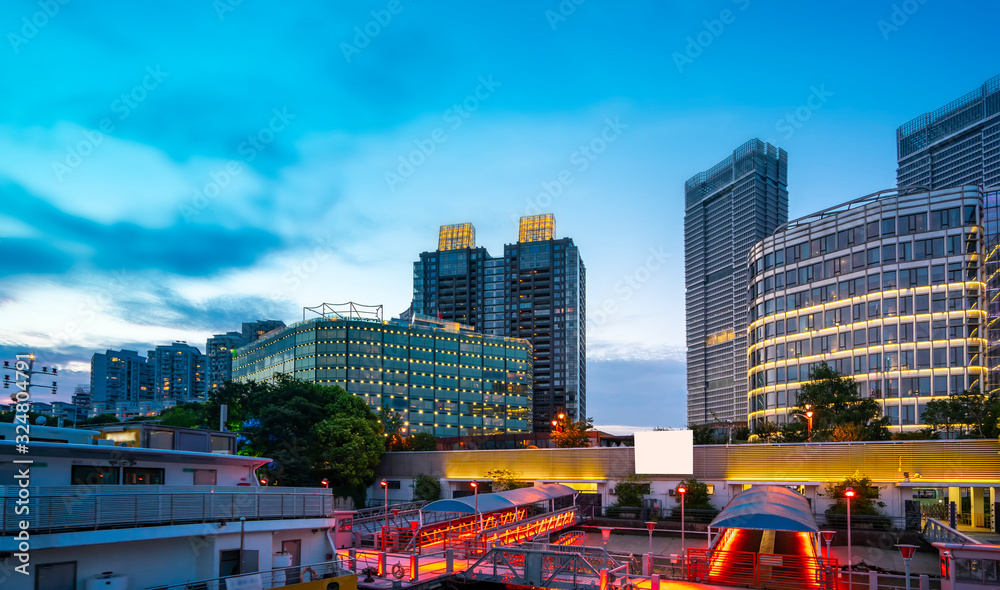 Night view and office building of architectural street in Lujiazui Financial District, Shanghai..