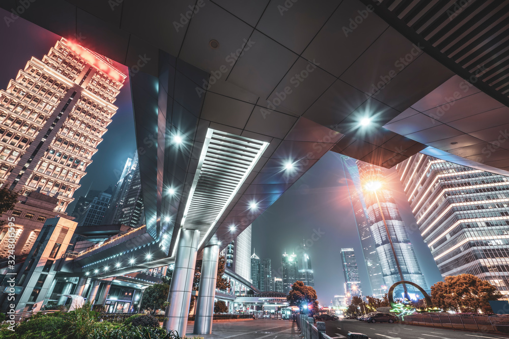 Night view and office building of architectural street in Lujiazui Financial District, Shanghai..