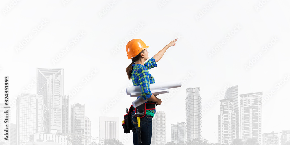 Woman architect in checkered blue shirt